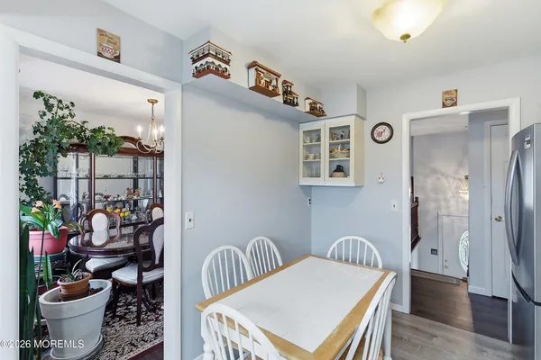 a room with furniture and a potted plant