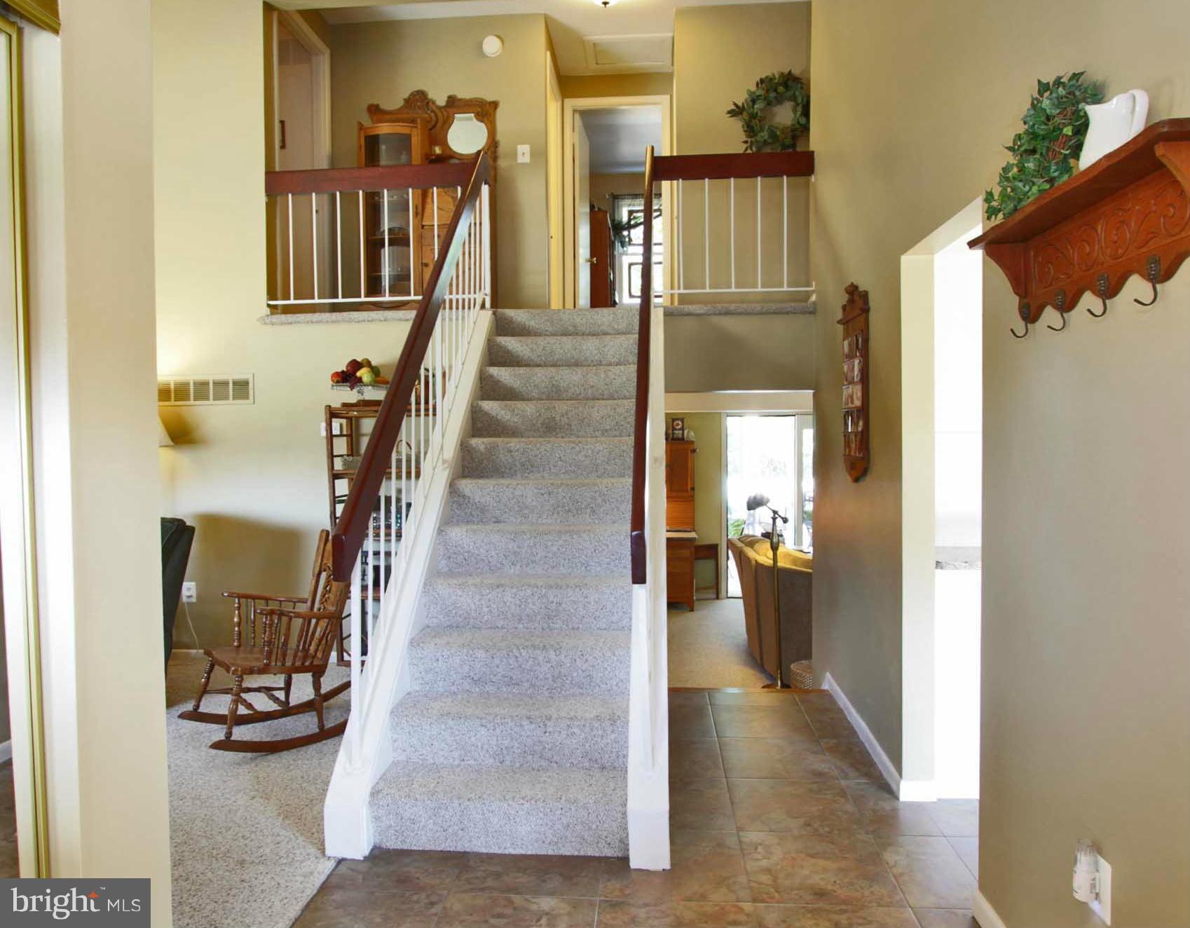 9219 Kilbride Road Baltimore, MD 21236 - Photo 7 of 30 a view of a hallway with staircase