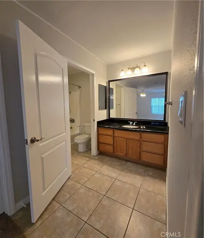 a view of balcony with wooden floor