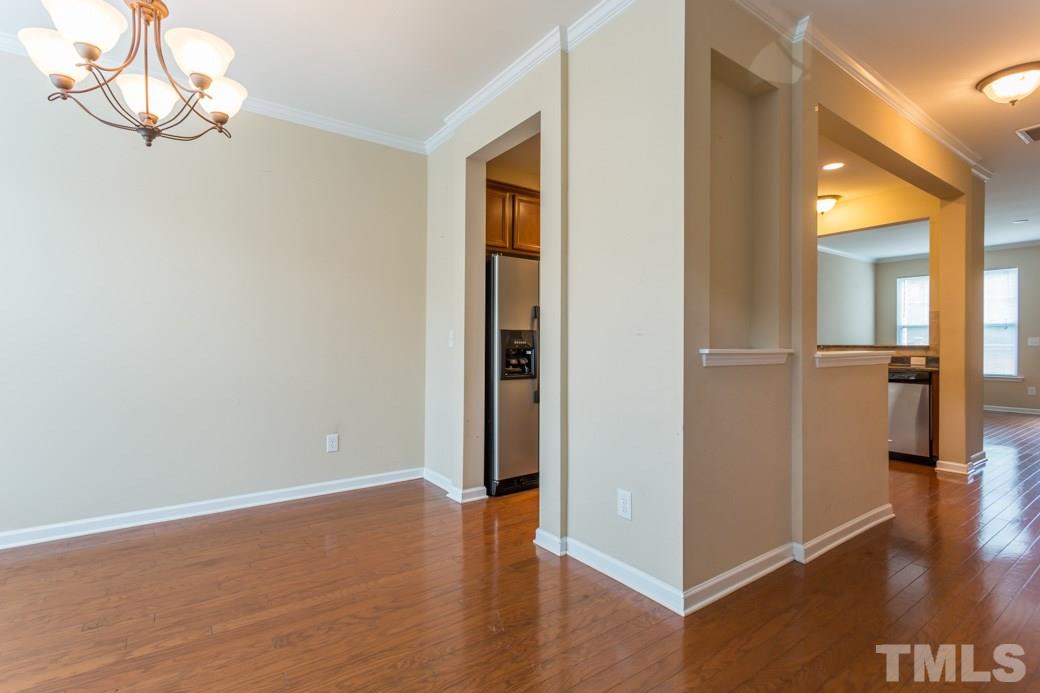 2946 Casona Way Raleigh, NC 27616 - Photo 3 of 25 wooden floor in an empty room