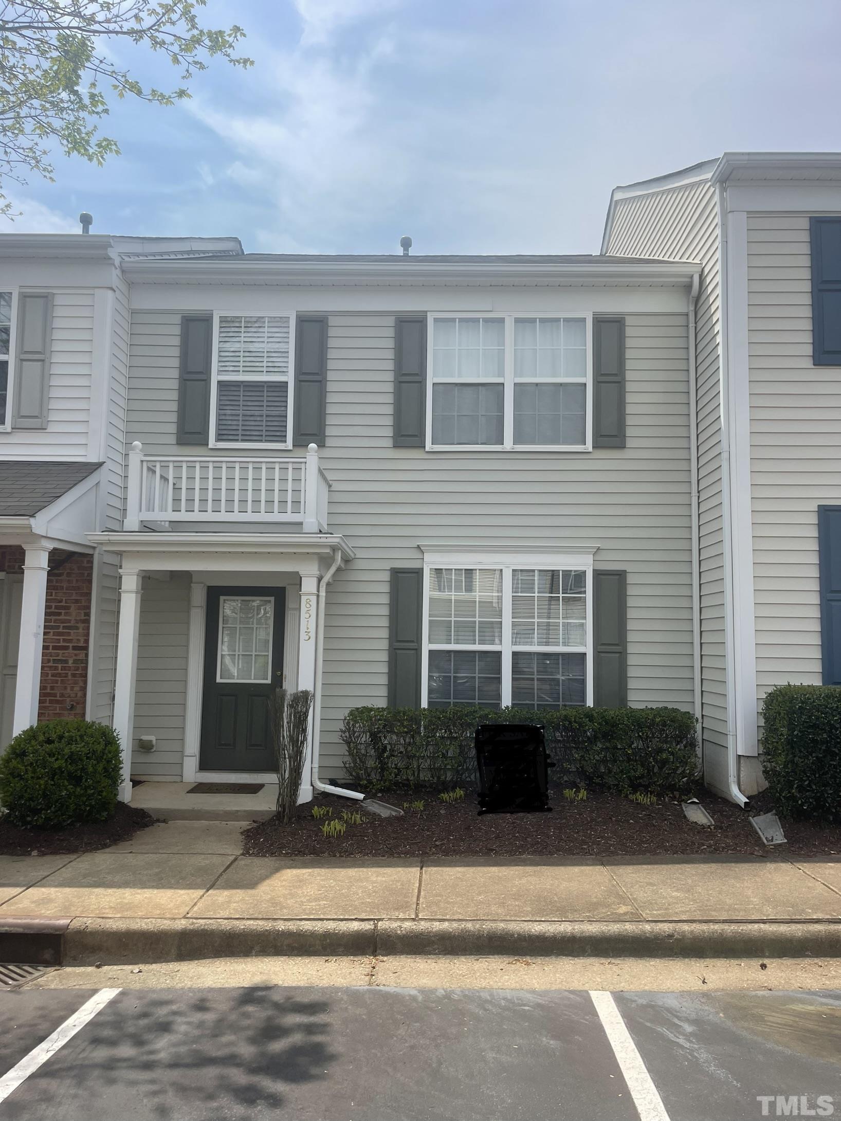 8513 Bright Loop Raleigh, NC 27613 - Photo 1 of 25 a front view of a house