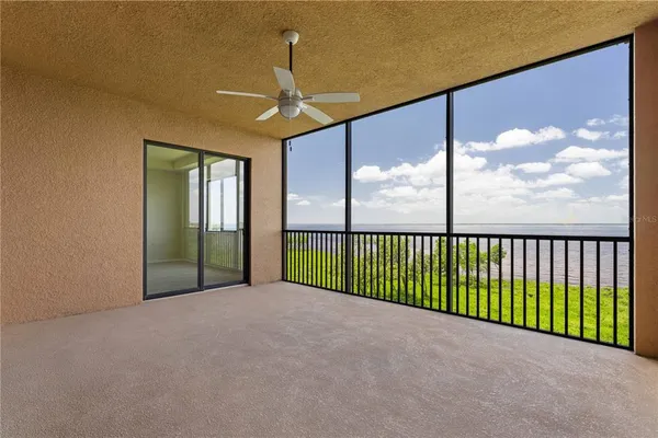 a view of a room with a floor to ceiling window