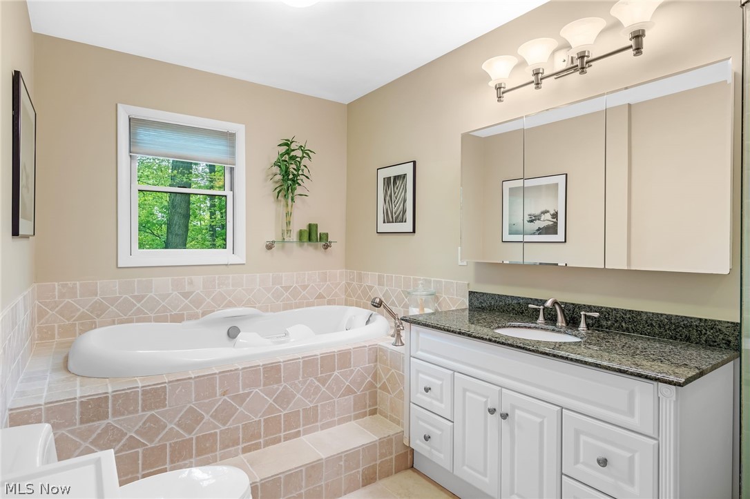 4587 Ranchwood Road Akron, OH 44333 - Photo 5 of 44 Primary Bath features Infinity Whirlpool.
