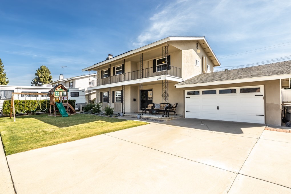 2114 Heloise Way Placentia, CA 92870 - Photo 2 of 61 a front view of a house with swimming pool