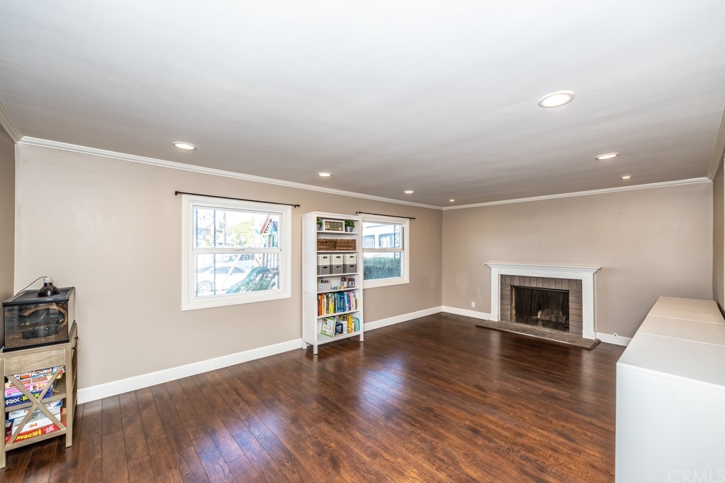 2114 Heloise Way Placentia, CA 92870 - Photo 21 of 61 wooden floor fireplace and natural light in room