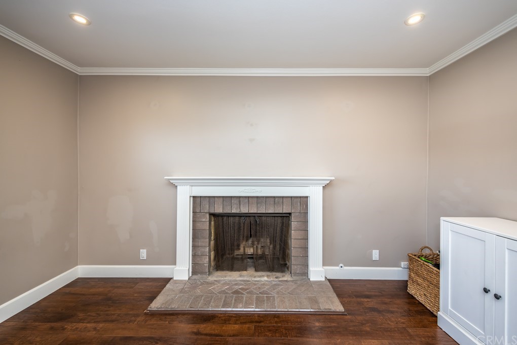2114 Heloise Way Placentia, CA 92870 - Photo 24 of 61 a view of a livingroom with an empty space and a fireplace