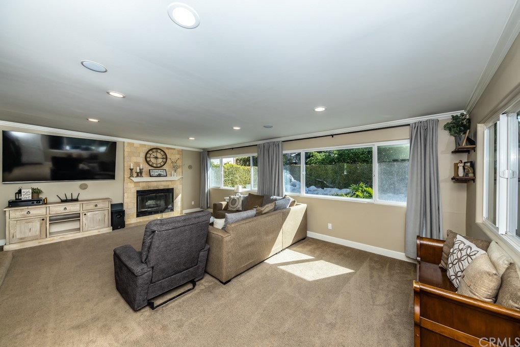 2114 Heloise Way Placentia, CA 92870 - Photo 30 of 61 a living room with furniture fireplace and flat screen tv