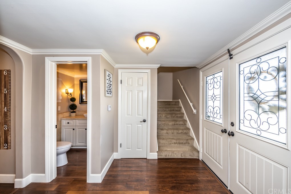 2114 Heloise Way Placentia, CA 92870 - Photo 31 of 61 a view of a hallway with wooden floor and staircase