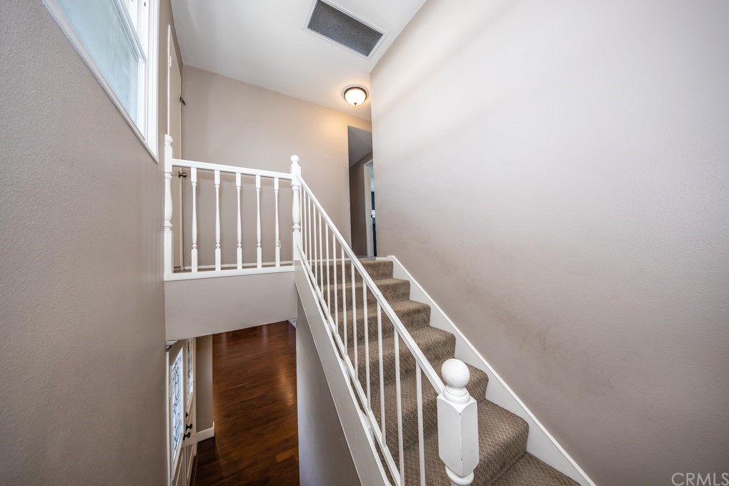 2114 Heloise Way Placentia, CA 92870 - Photo 34 of 61 a view of staircase with wooden floor and white walls
