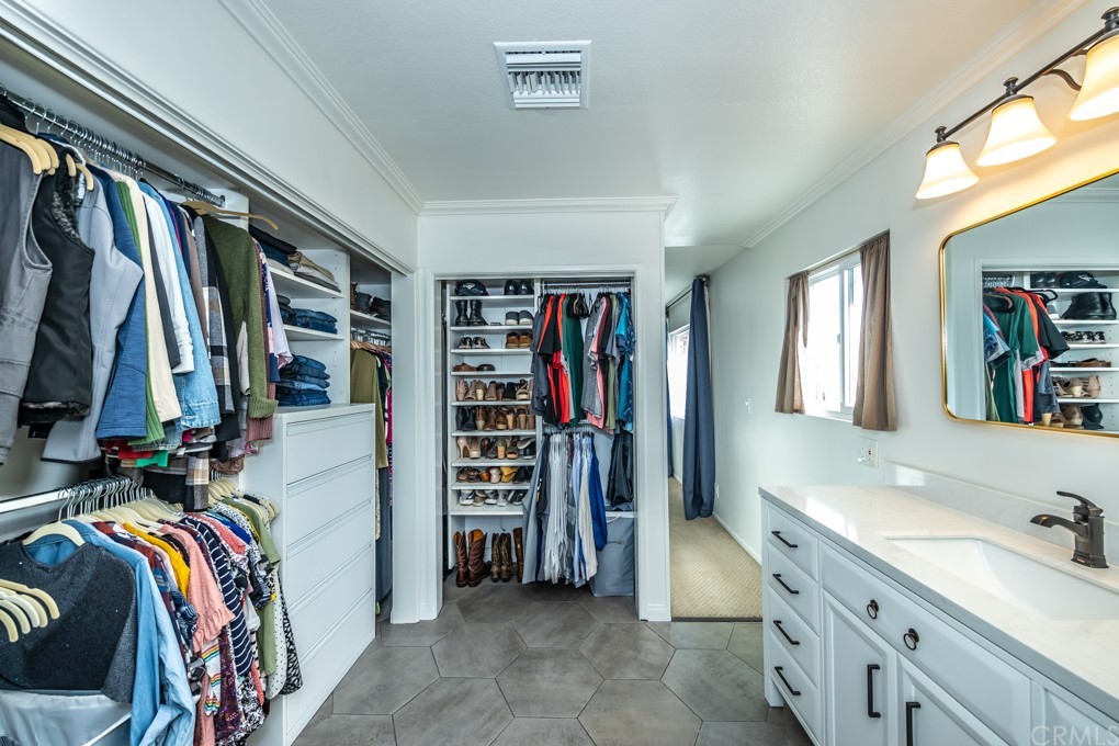 2114 Heloise Way Placentia, CA 92870 - Photo 40 of 61 a view of walk in closet with clothes and shoes
