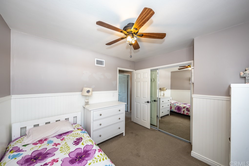 2114 Heloise Way Placentia, CA 92870 - Photo 47 of 61 a bedroom with a bed and a chandelier