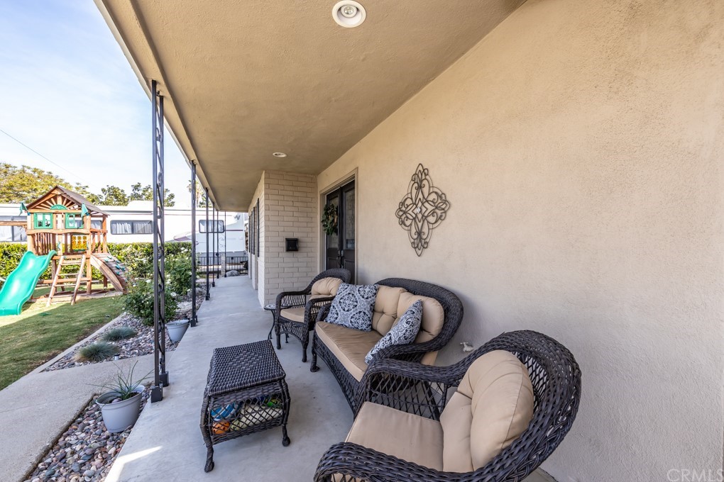 2114 Heloise Way Placentia, CA 92870 - Photo 5 of 61 a living room with furniture and a floor to ceiling window