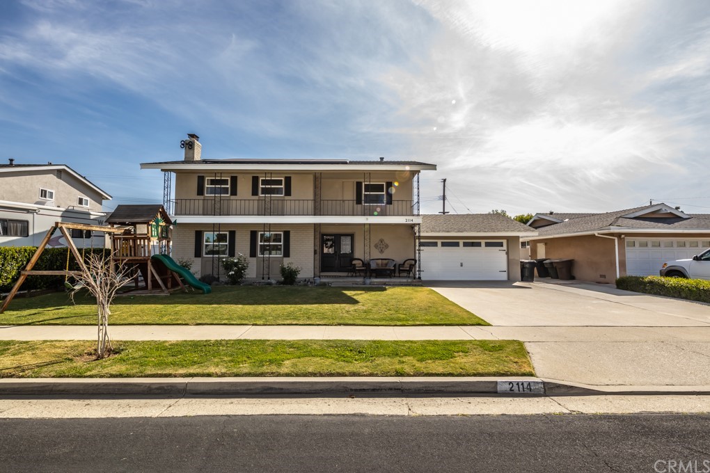 2114 Heloise Way Placentia, CA 92870 - Photo 60 of 61 a view of a house with a big yard and large trees