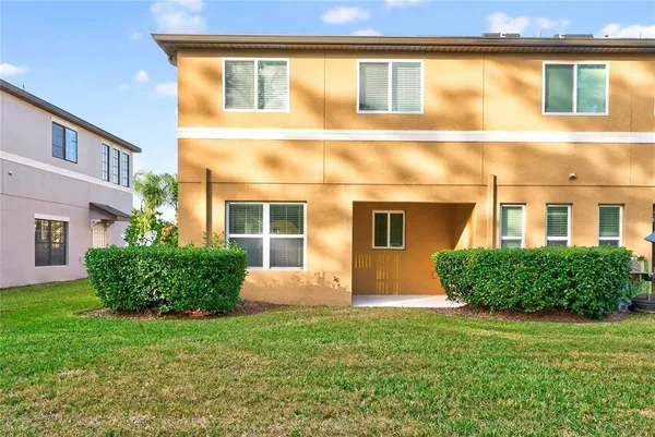 front view of a house with a yard