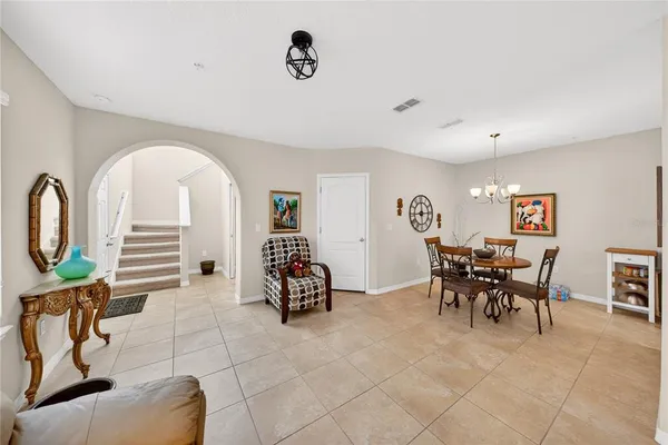 a view of a livingroom with furniture and a table
