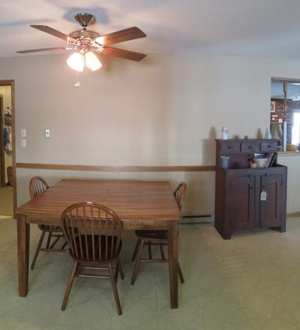 1202 Nelson Road Rock Falls, IL 61071 - Photo 11 of 31 a view of a dining room with furniture and chandelier