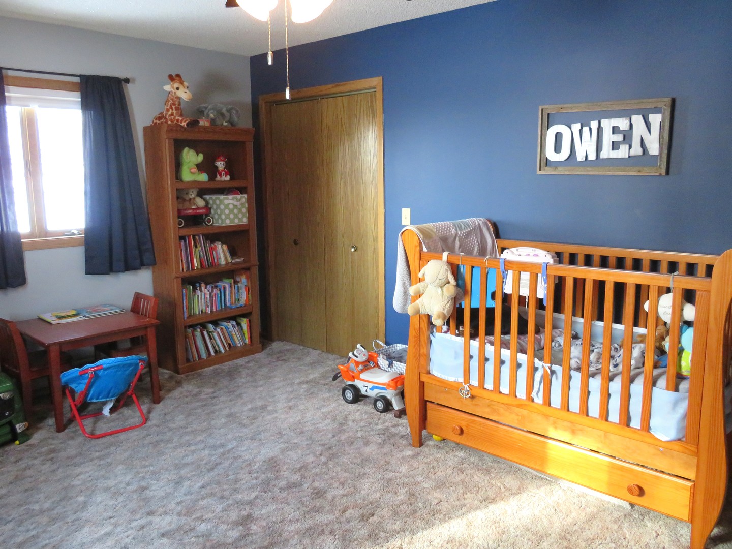 1202 Nelson Road Rock Falls, IL 61071 - Photo 21 of 31 a bedroom with furniture and book shelf