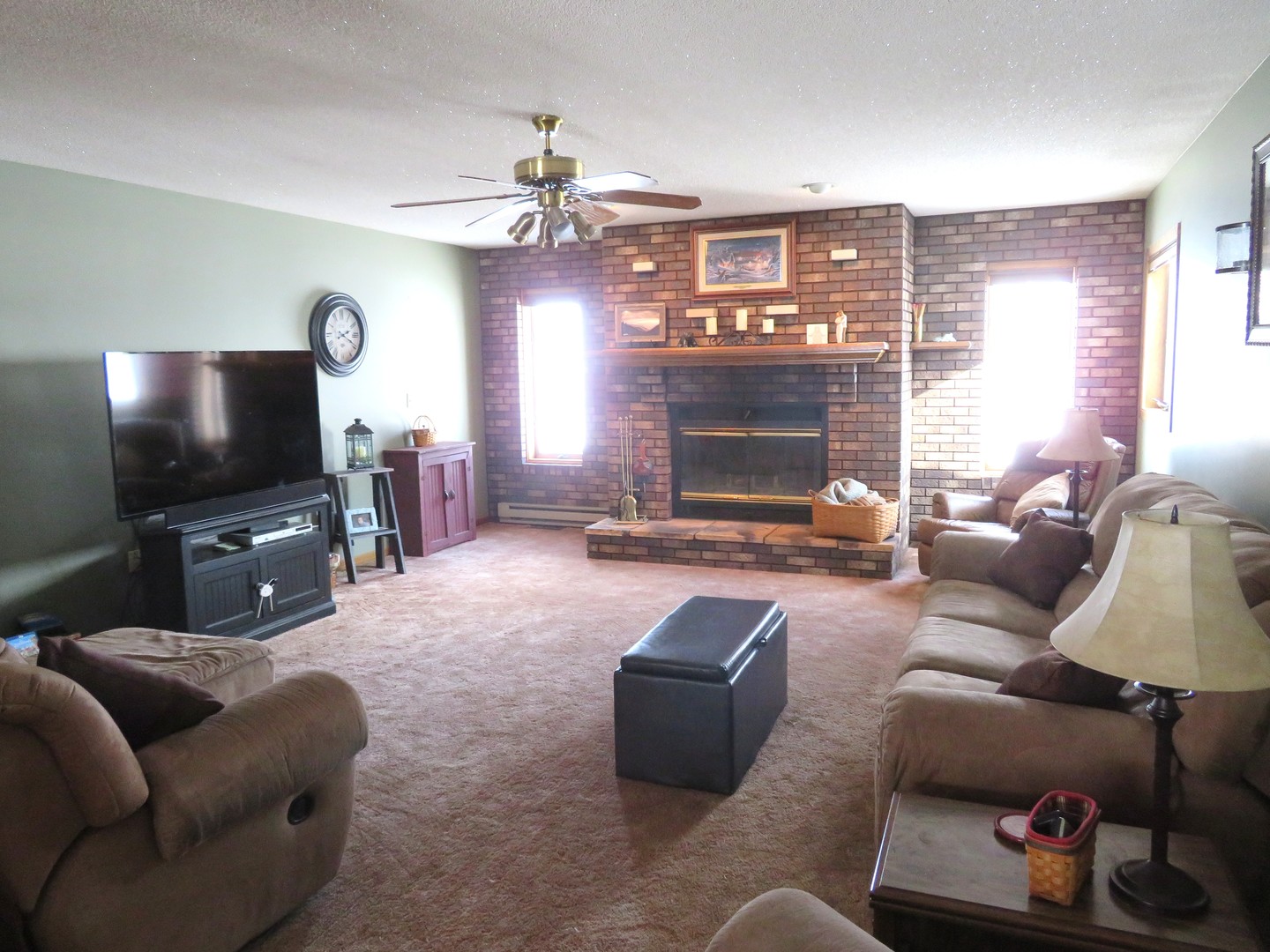 1202 Nelson Road Rock Falls, IL 61071 - Photo 5 of 31 a living room with furniture and a flat screen tv