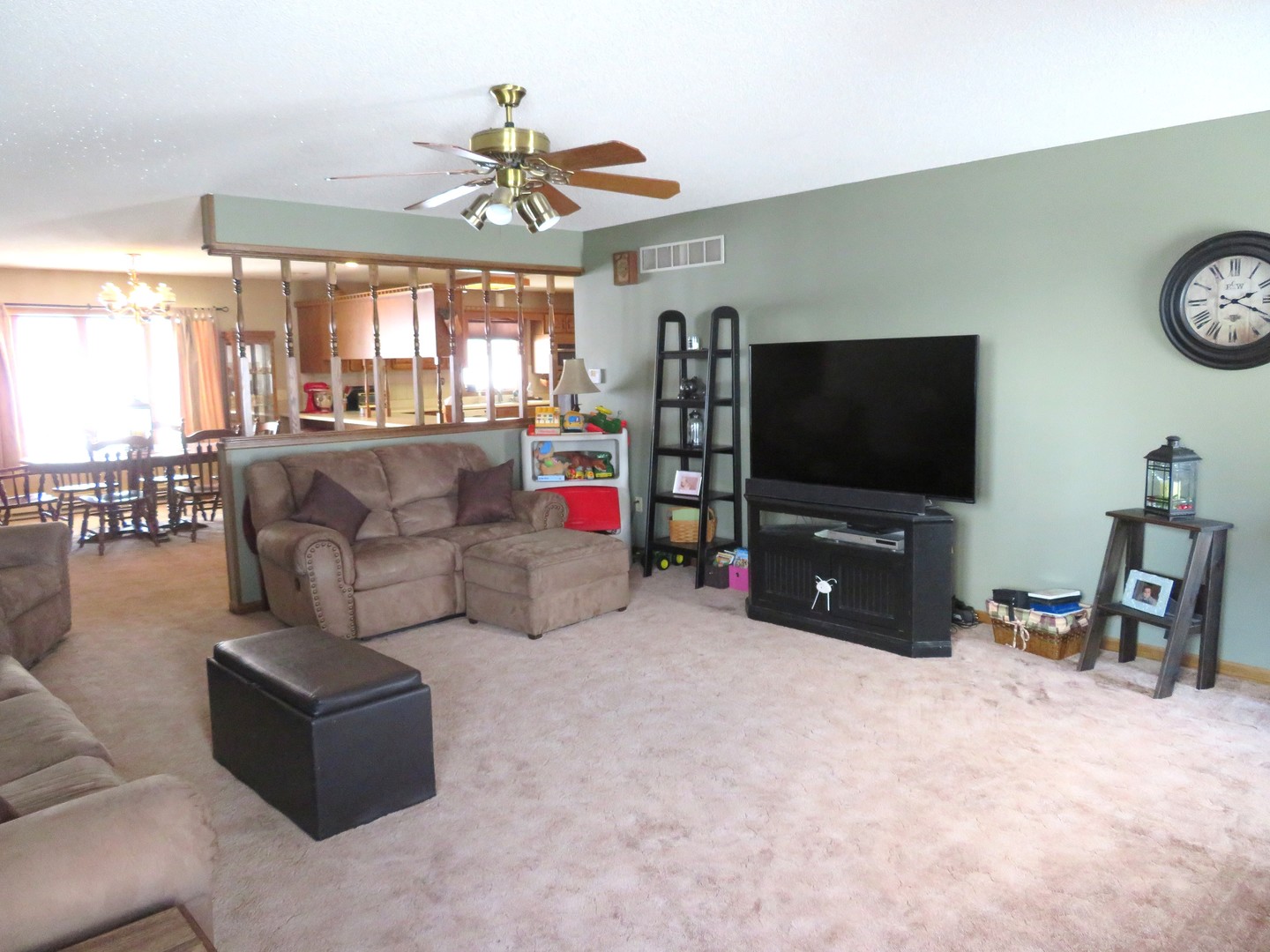 1202 Nelson Road Rock Falls, IL 61071 - Photo 7 of 31 a living room with furniture and a flat screen tv