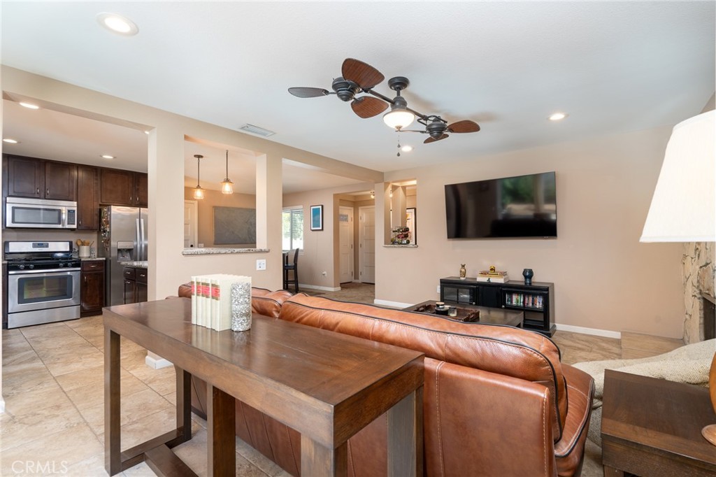 3165 Celeste Drive Riverside, CA 92507 - Photo 12 of 44 a kitchen with a table and chairs in it
