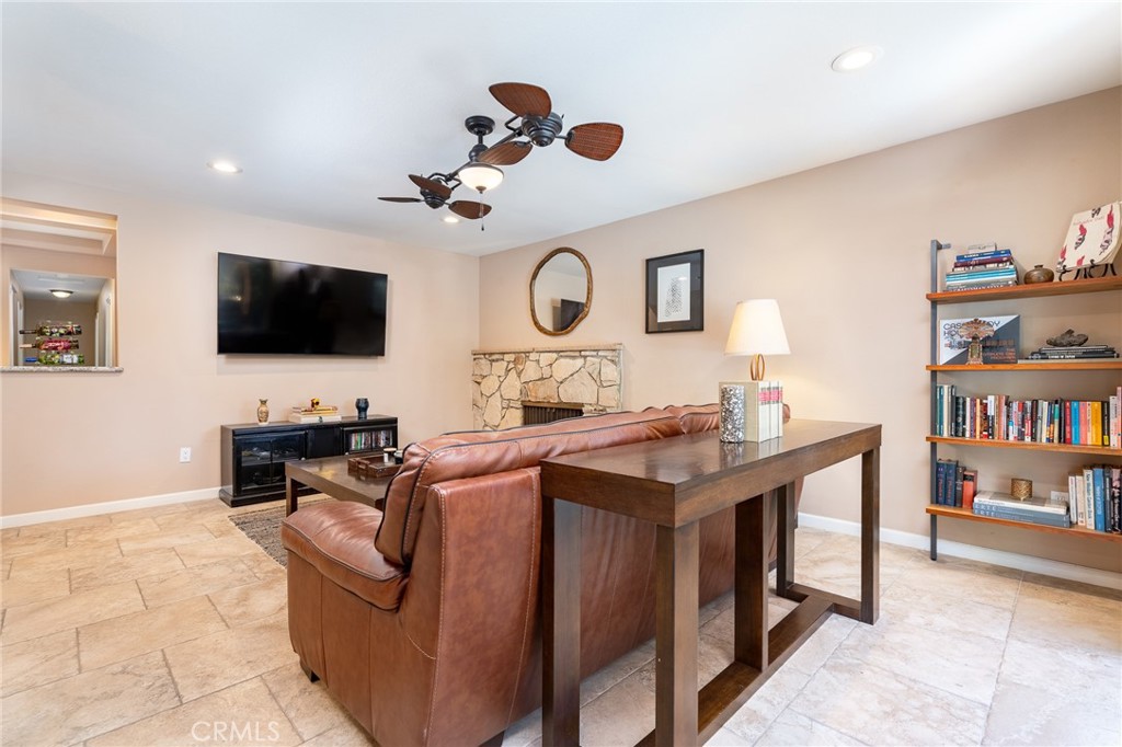 3165 Celeste Drive Riverside, CA 92507 - Photo 13 of 44 a living room with furniture and a flat screen tv