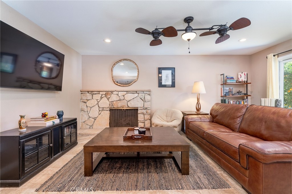 3165 Celeste Drive Riverside, CA 92507 - Photo 14 of 44 a living room with furniture and a flat screen tv