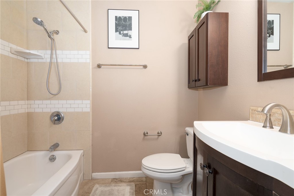 3165 Celeste Drive Riverside, CA 92507 - Photo 18 of 44 a bathroom with a sink toilet and shower