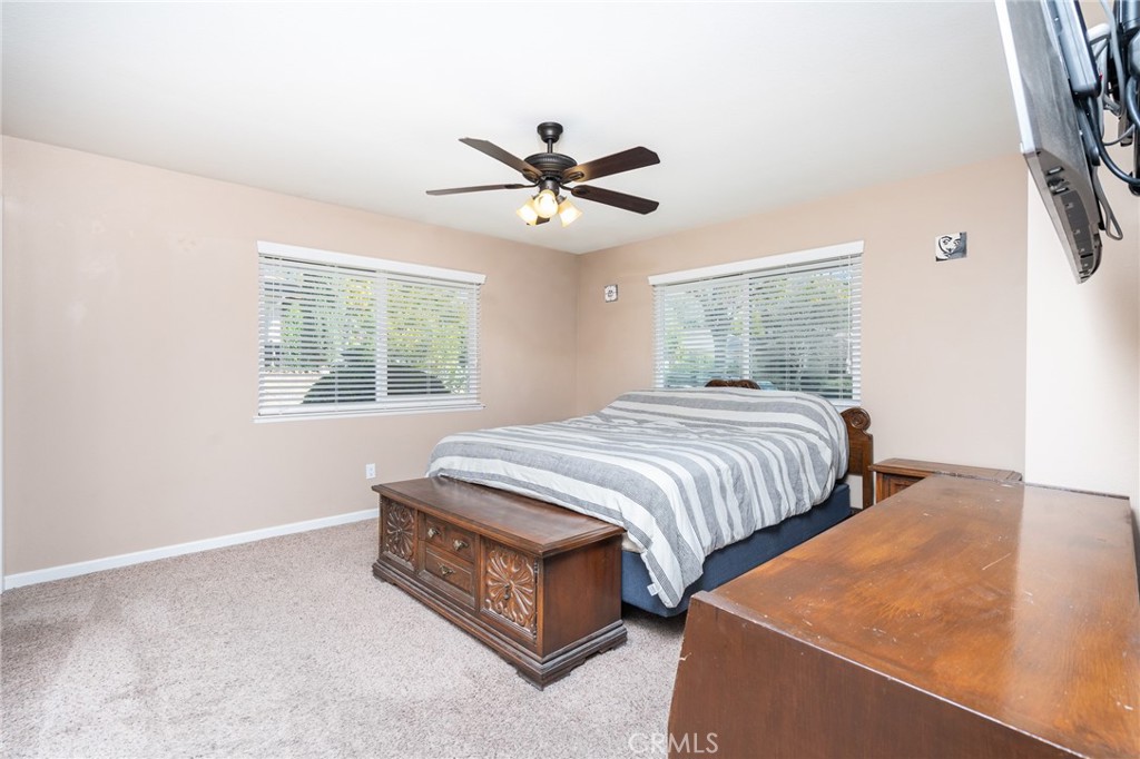 3165 Celeste Drive Riverside, CA 92507 - Photo 24 of 44 a bedroom with beds and a window