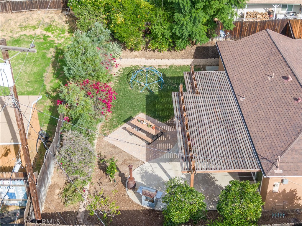 3165 Celeste Drive Riverside, CA 92507 - Photo 39 of 44 a view of backyard with plants and outdoor seating