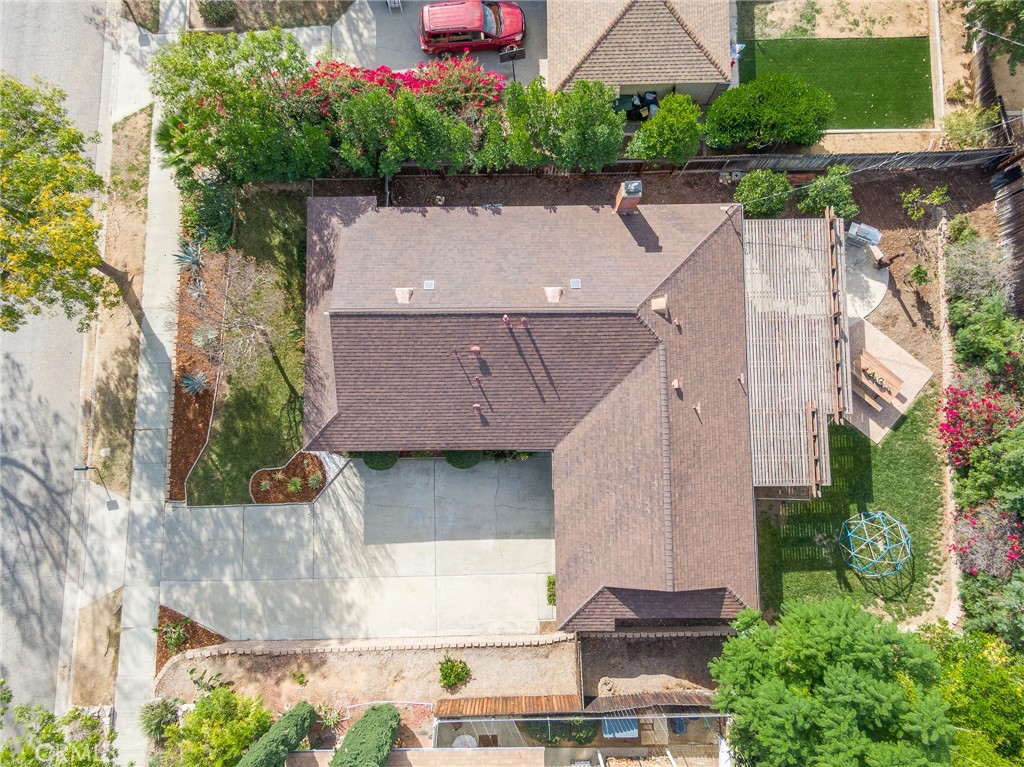 3165 Celeste Drive Riverside, CA 92507 - Photo 43 of 44 an aerial view of a house with a yard and a large tree