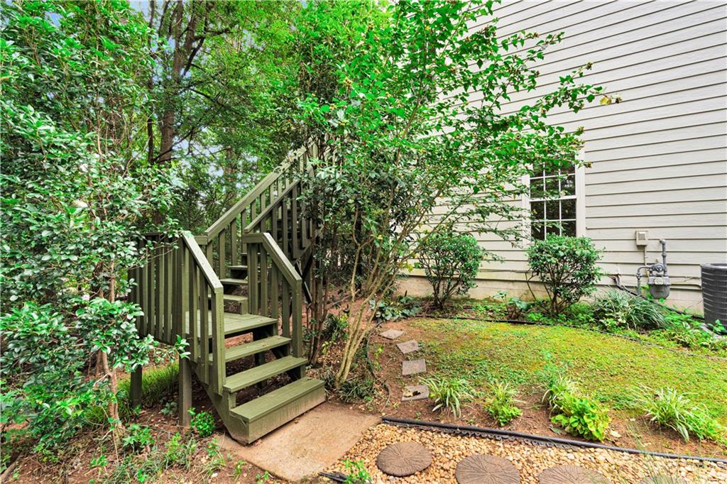 4005 Spring Cove Drive Duluth, GA 30097 - Photo 5 of 23 a view of a house with a yard