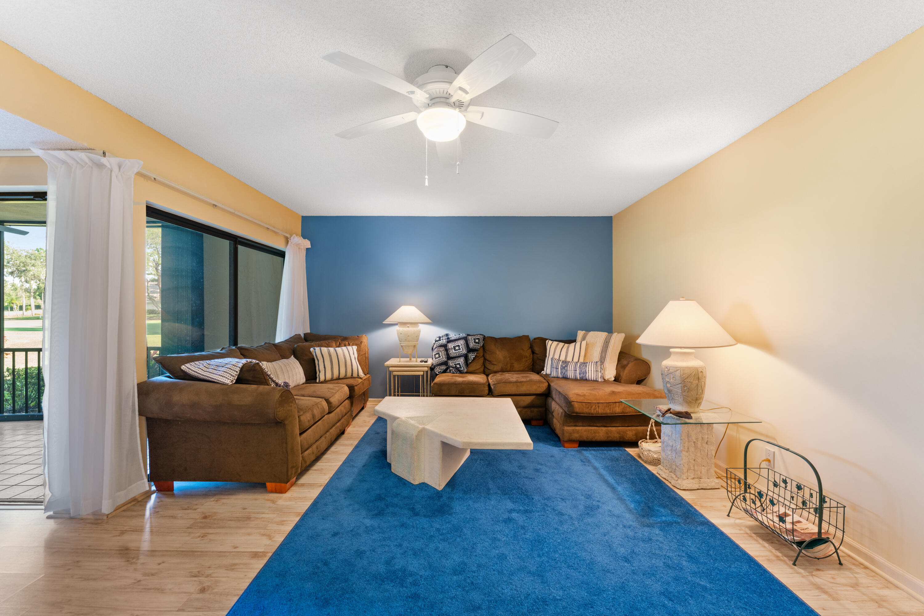 16970 Waterbend Drive, Unit 146 Jupiter, FL 33477 - Photo 6 of 30 a living room with furniture and a large window