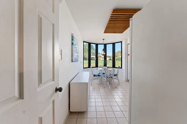 a view of entryway and hall with a window