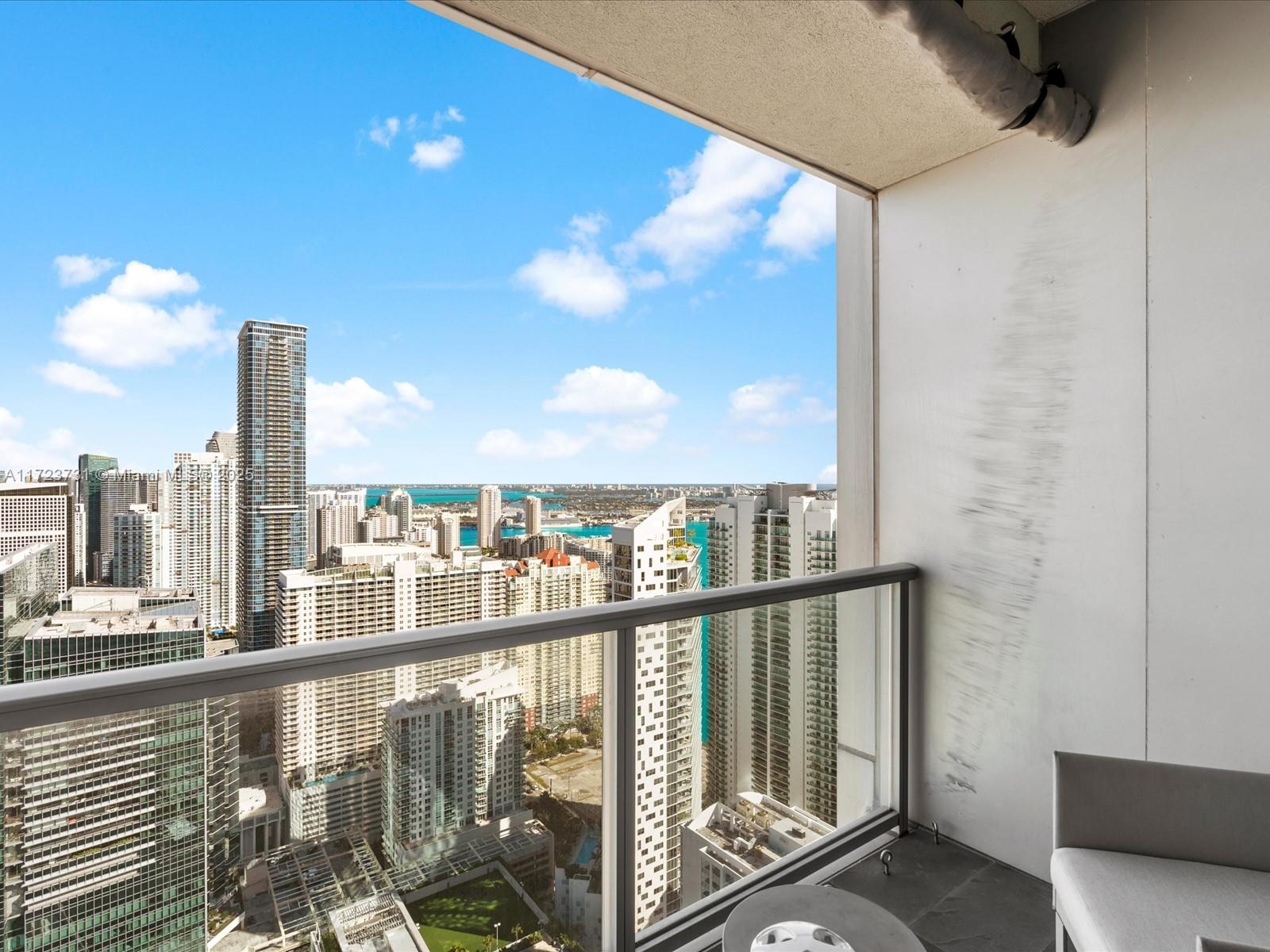 1425 Brickell Avenue, Unit 52BC Miami, FL 33131 - Photo 50 of 72 a view of a balcony with city view