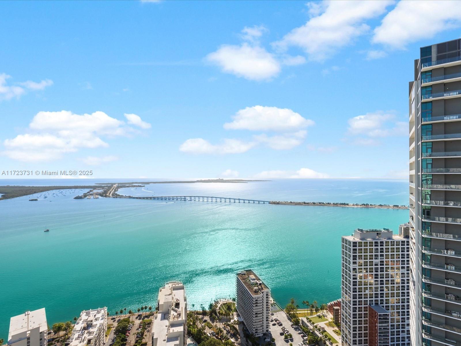 1425 Brickell Avenue, Unit 52BC Miami, FL 33131 - Photo 63 of 72 a view of a lake with a city view