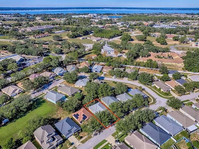 an aerial view of a city with lots of residential buildings