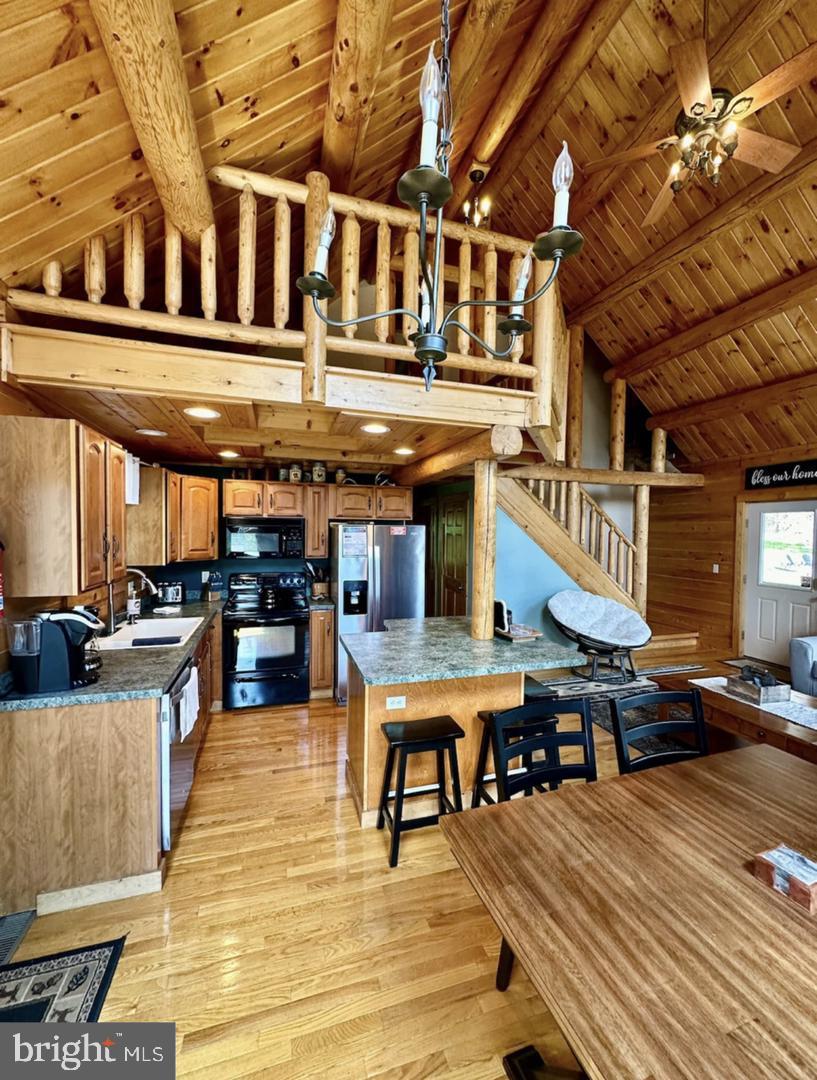 229 Rock Lodge Road McHenry, MD 21541 - Photo 2 of 16 Rustic charm in a cozy kitchen retreat.