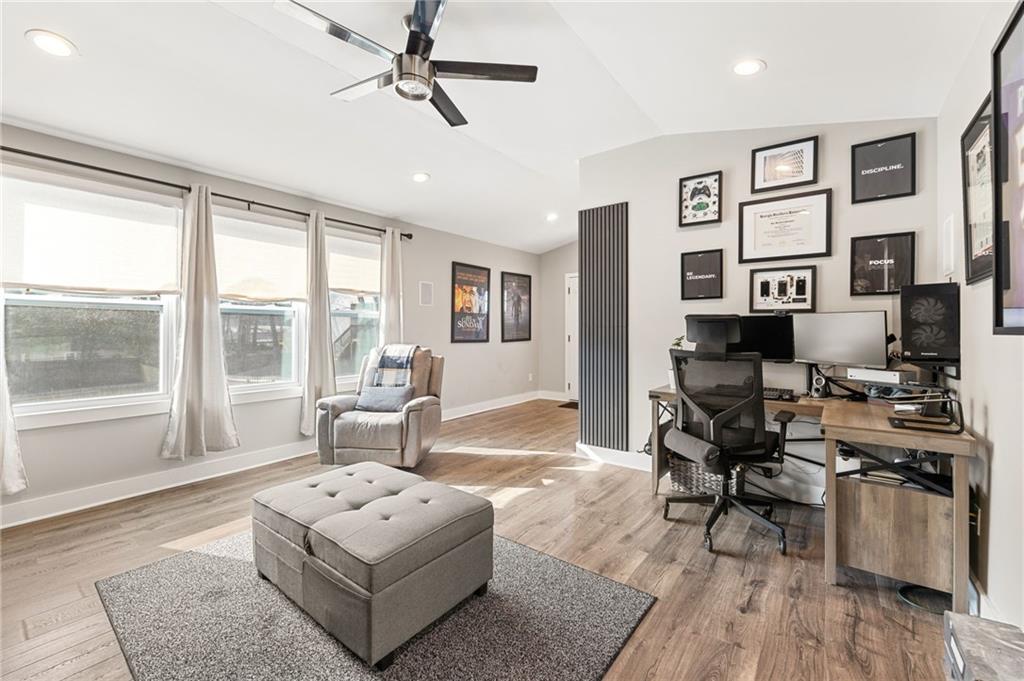 221 Laurel Avenue Southwest Atlanta, GA 30314 - Photo 12 of 29 a living room with furniture and wooden floor