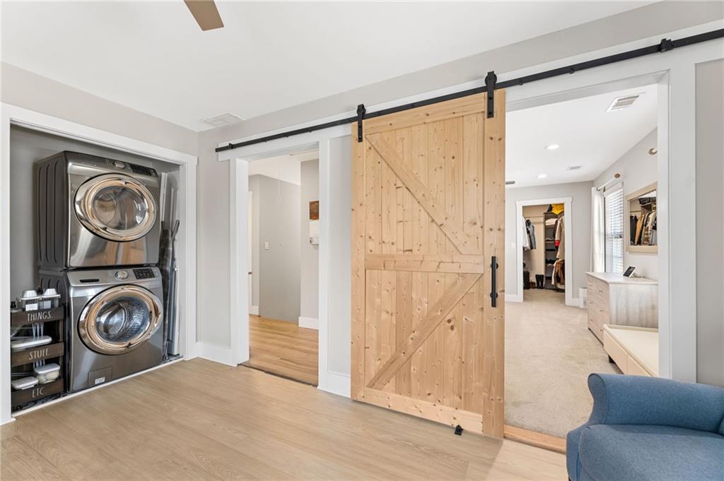 221 Laurel Avenue Southwest Atlanta, GA 30314 - Photo 19 of 29 a view of a hallway with washer and dryer