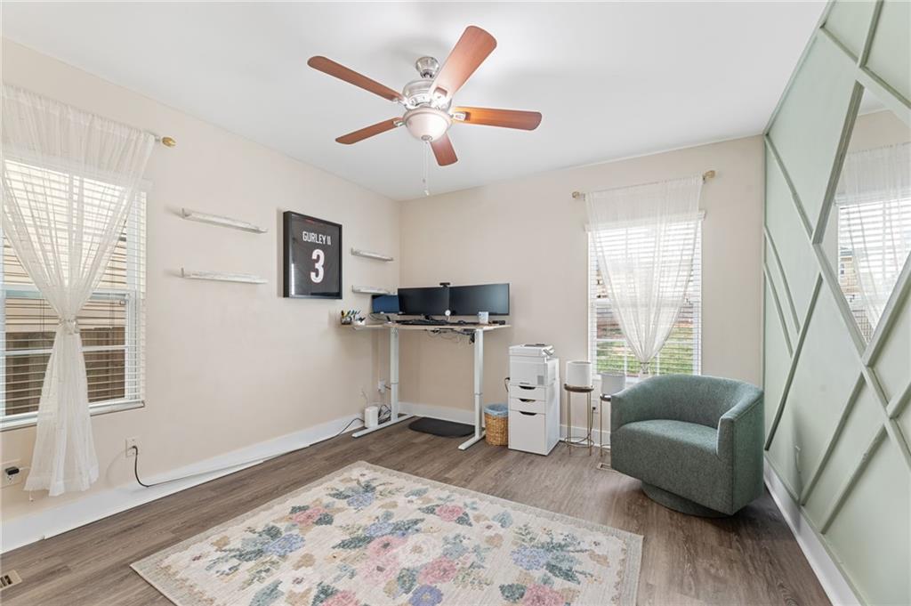 221 Laurel Avenue Southwest Atlanta, GA 30314 - Photo 2 of 29 a living room with furniture and a window