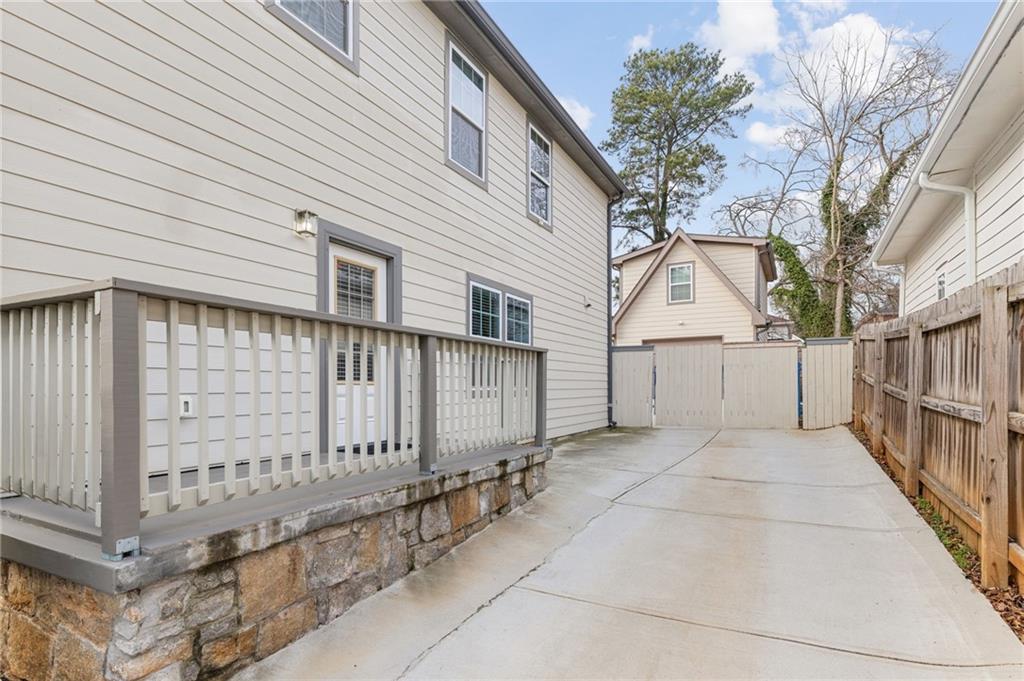 221 Laurel Avenue Southwest Atlanta, GA 30314 - Photo 26 of 29 a view of a house with a wooden fence