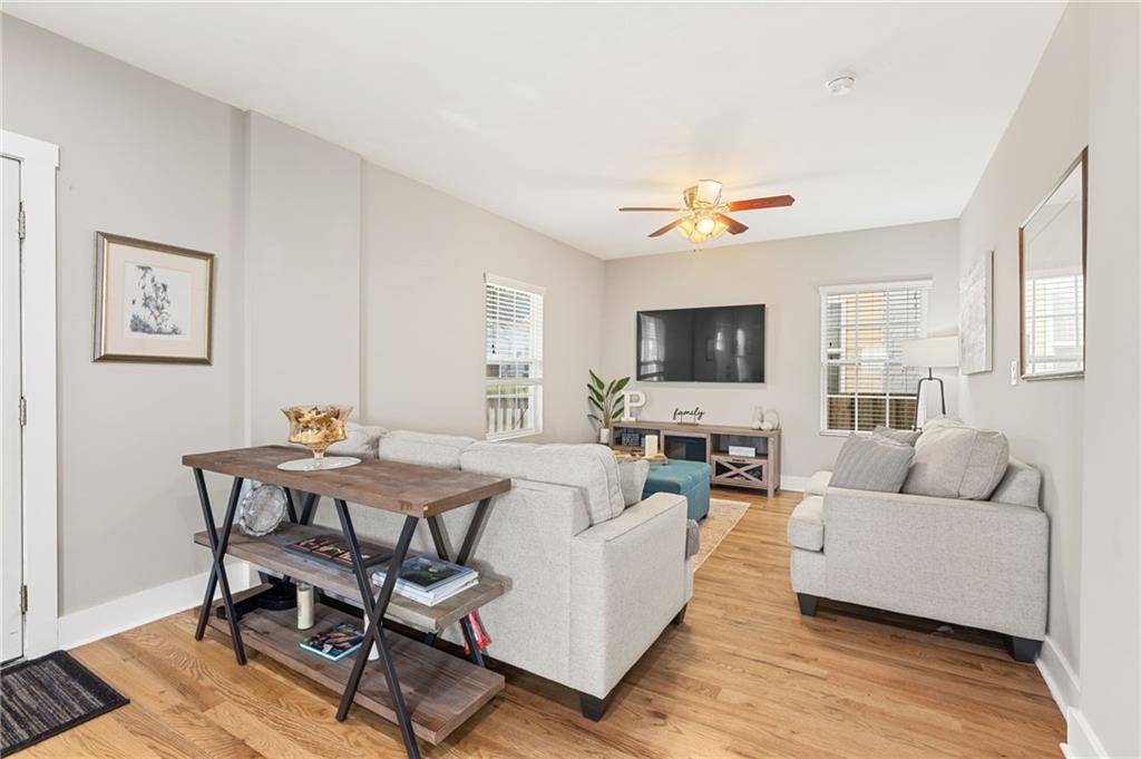 221 Laurel Avenue Southwest Atlanta, GA 30314 - Photo 28 of 29 a living room with furniture and a flat screen tv