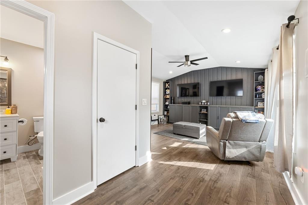 221 Laurel Avenue Southwest Atlanta, GA 30314 - Photo 9 of 29 a living room with furniture and a flat screen tv