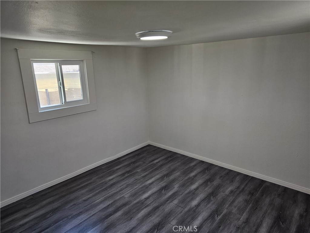 22775 Raymond Road Perris, CA 92570 - Photo 15 of 23 wooden floor in an empty room