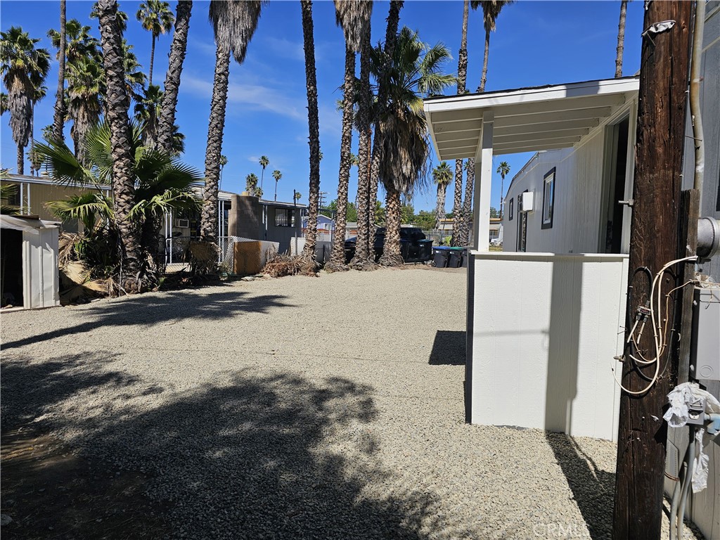 22775 Raymond Road Perris, CA 92570 - Photo 5 of 23 a view of a house with backyard and sitting area