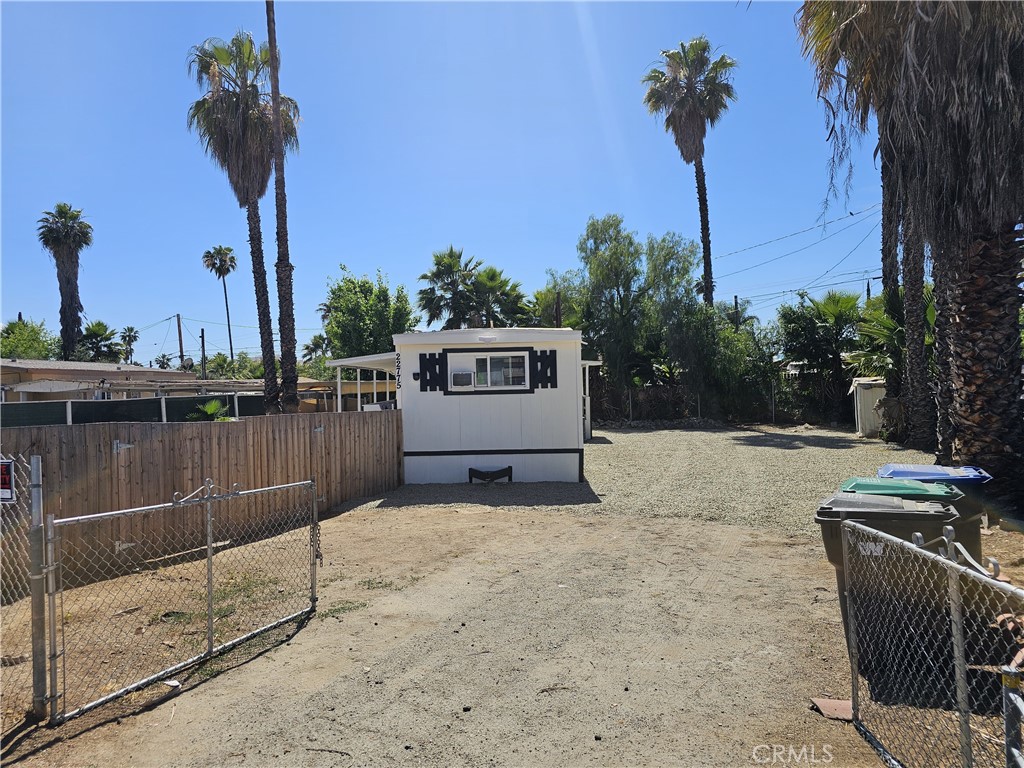 22775 Raymond Road Perris, CA 92570 - Photo 7 of 23 a house view with a backyard space