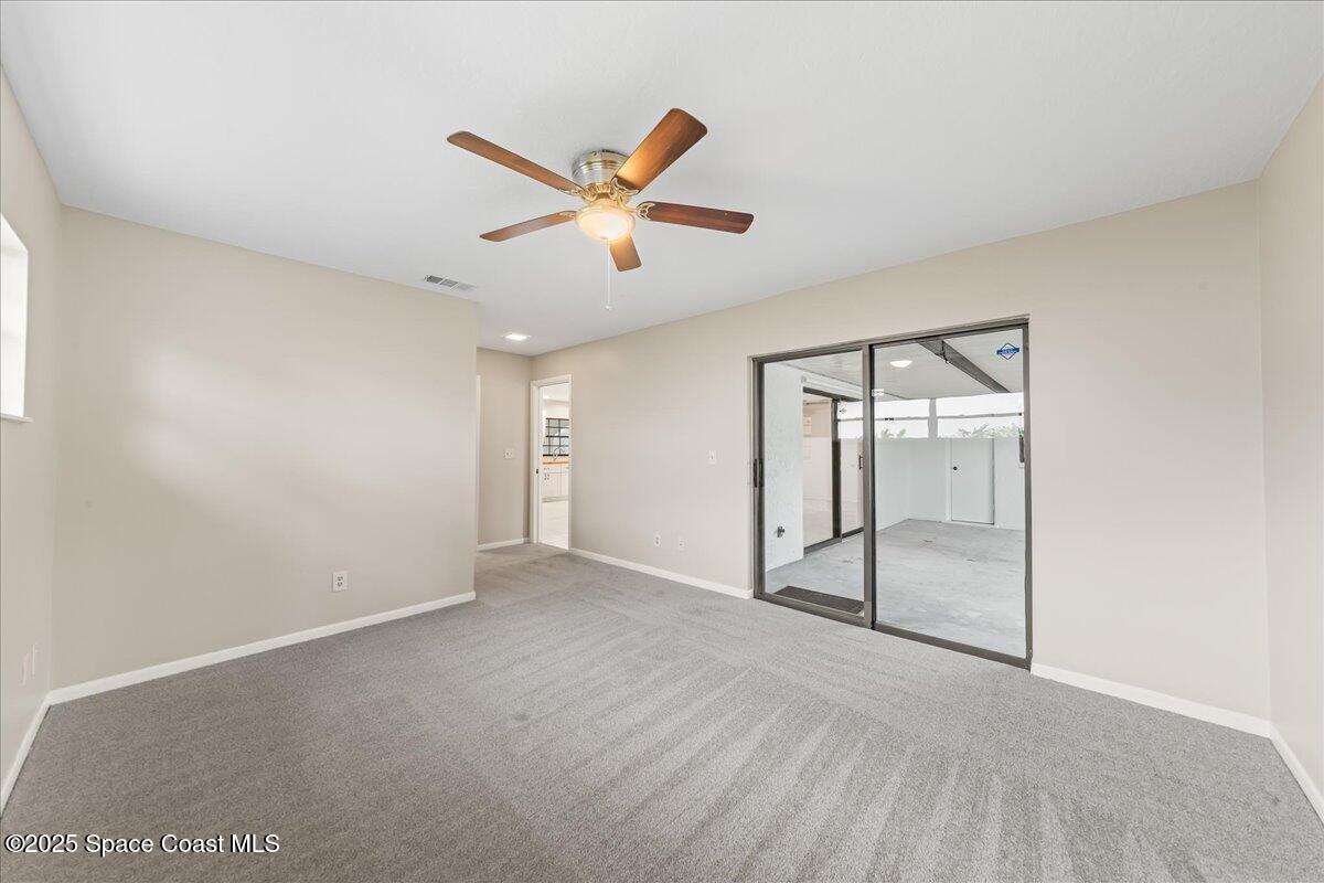 2010 Talloak Road Melbourne, FL 32935 - Photo 11 of 45 wooden floor in an empty room