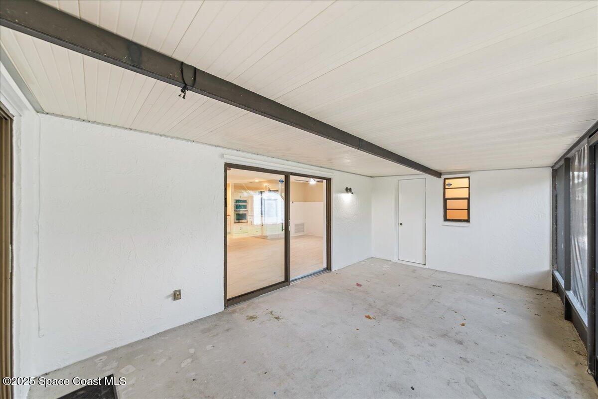 2010 Talloak Road Melbourne, FL 32935 - Photo 18 of 45 a view of an empty room with a window