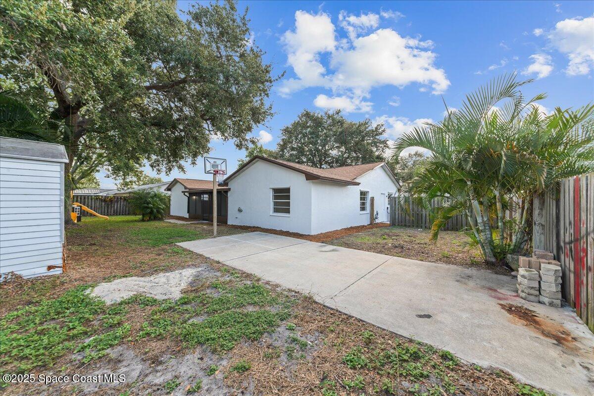 2010 Talloak Road Melbourne, FL 32935 - Photo 19 of 45 a front view of a house with garden
