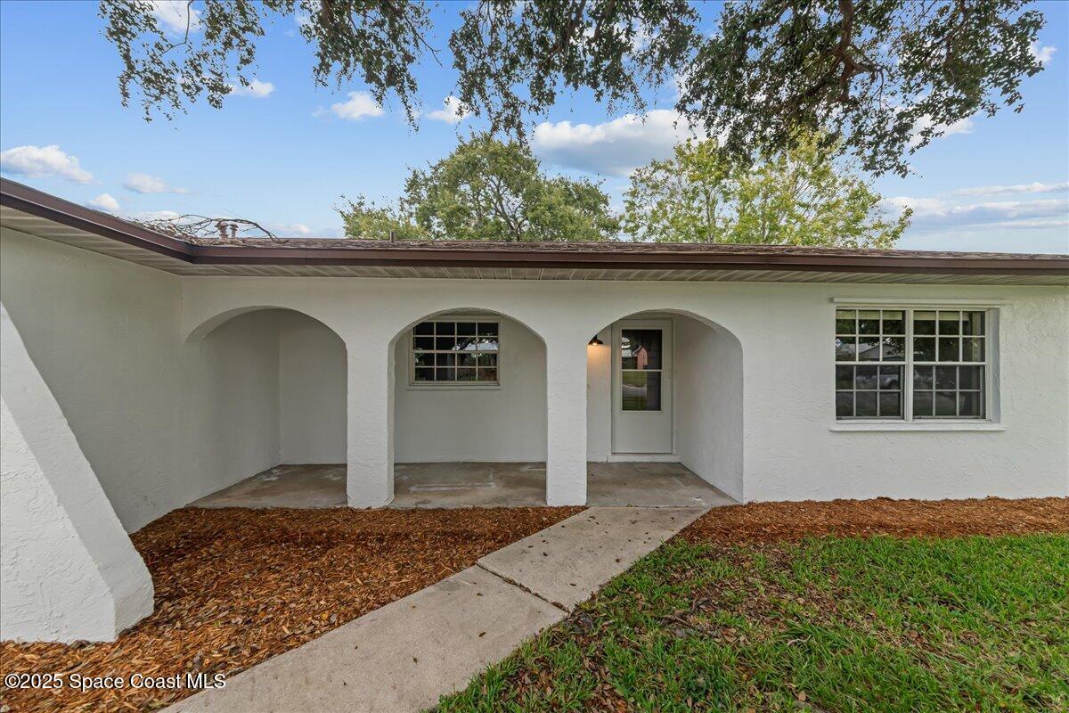 2010 Talloak Road Melbourne, FL 32935 - Photo 30 of 45 a front view of a house